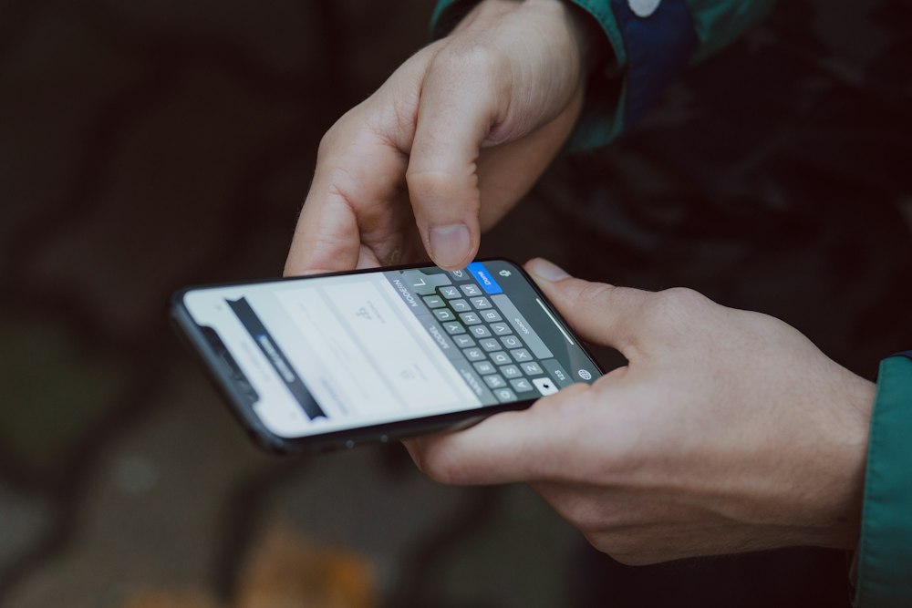 A customer reading a shipment update on a phone